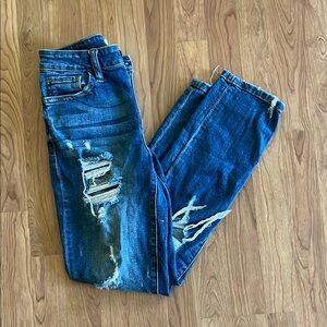 Women’s Medium Wash Distressed Straight Leg Jeans in size 25 x 27